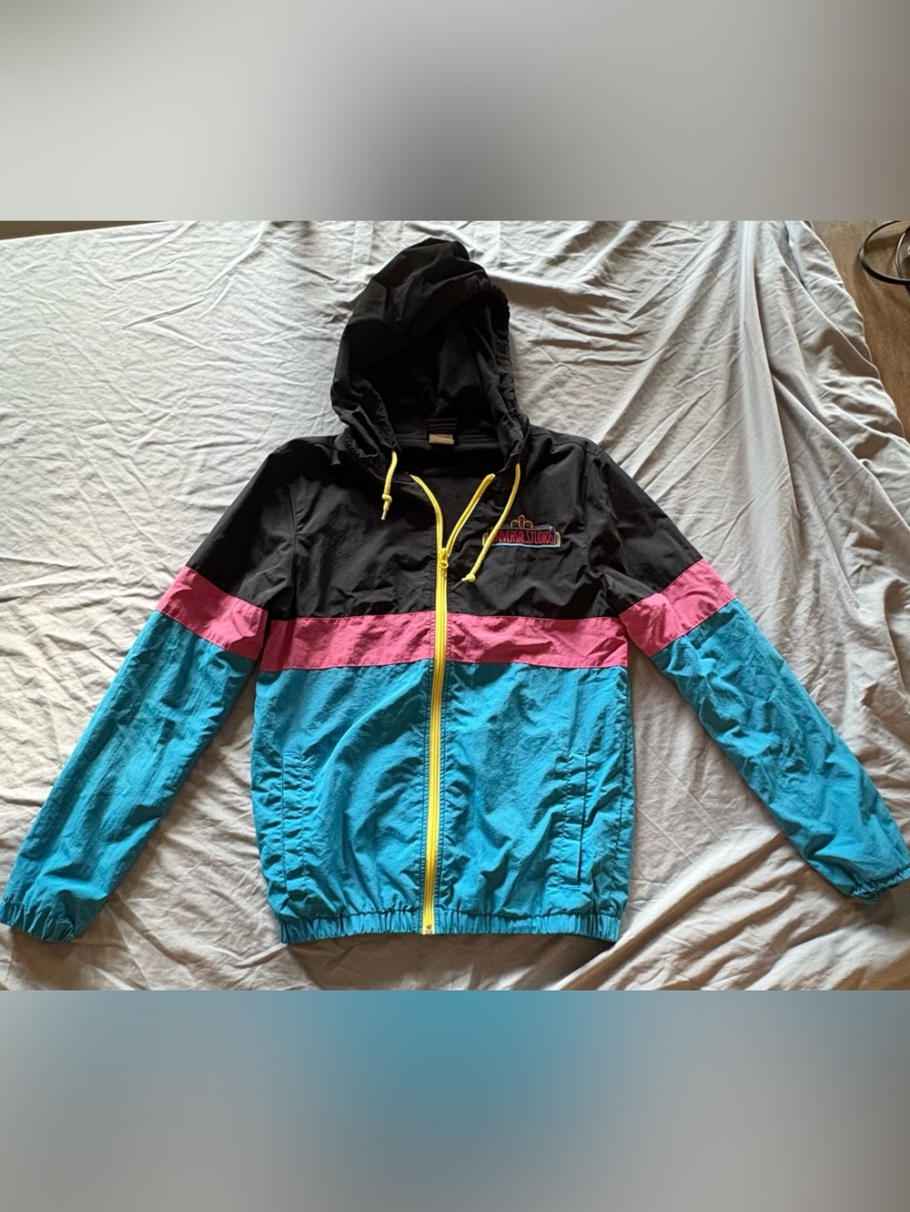 Universal Studios Colorblock Hooded Windbreaker in Black, Pink & Teal